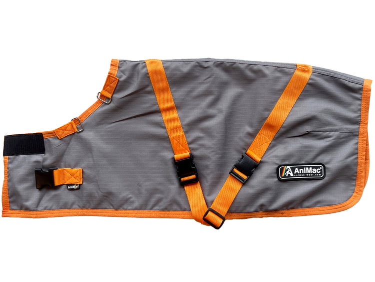A gray and orange Super Calf Jacket | Lightweight Waterproof dog coat with adjustable orange straps, black buckles, and an AniMac brand patch, designed like a waterproof calf jacket for easy, comfortable fastening.