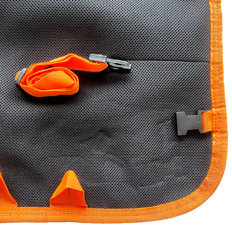 A close-up of AniMac’s Sheep Coat | Waterproof shows black fabric with orange trim, an orange strap with a black buckle, and a black plastic hook on the right—matching the coat’s distinctive features.